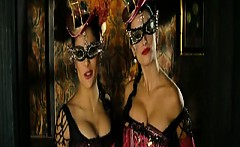 Salma Hayek and Penelope Cruz wearing showgirl outfits that