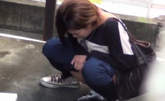 Asian Urinates In Street