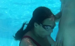 Submerged underwater with a dick inside her