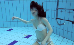 Roxalana Cheh sexy redhead underwater