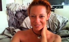 Amateur redhead poses and masturbates with toys