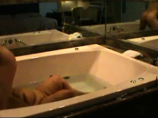 Fat Ebony mom caught with toyboy in jacuzzi