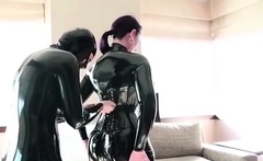 Two Lesbian Beauty Try Their New Corset with Latex