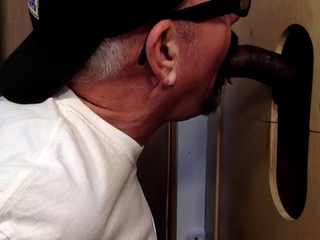 Gloryhole mature gay sucks black meat
