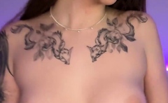 A beauty in a rabbit mask flashing her yam-sized tits, full